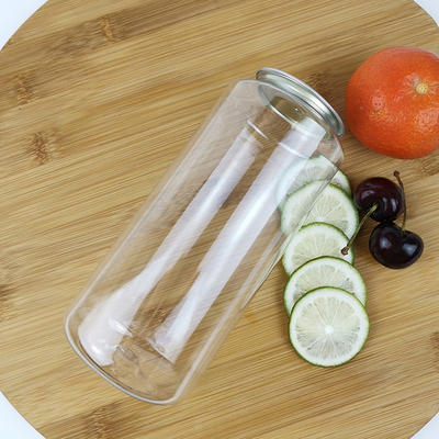 Plastikowe butelki z przezroczystą wodą o pojemności 700 ml z pokrywkami do puszek z sosem do sałatek z olejków eterycznych